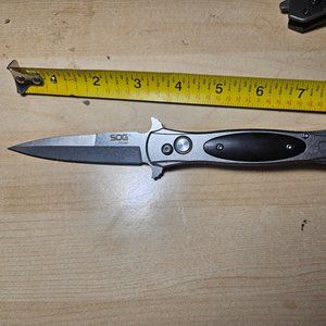 Chinese knock off Labeled SOG - Possibly Russian "Hornet"  Auto Folding knife